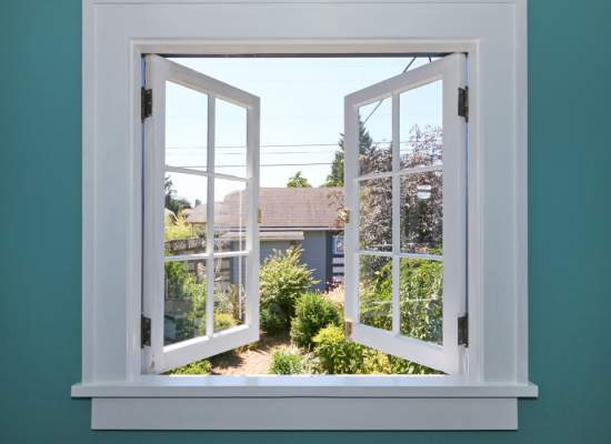 window with glass panes and doors that swing out
